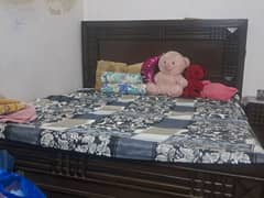 Wooden bed with 2 side table