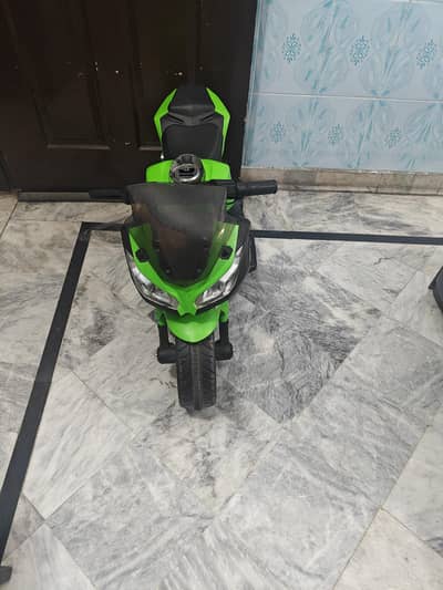 scooter for sale in green and   black colour