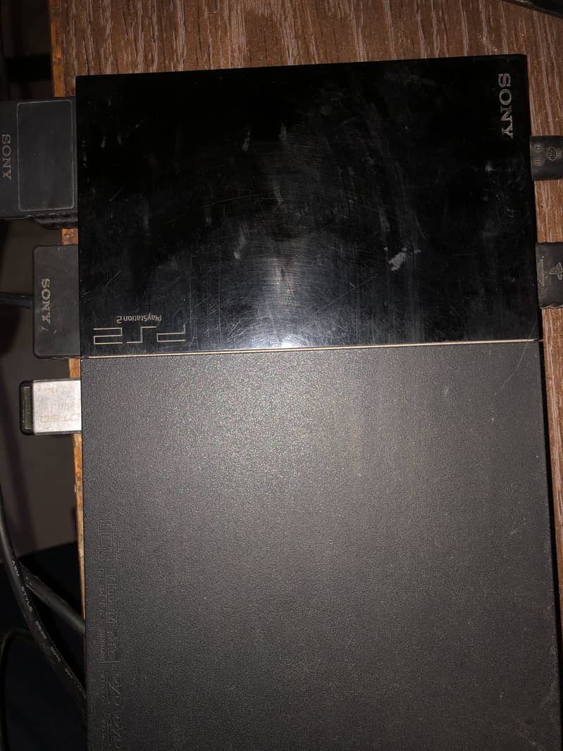 ps 2 with 2 controllers ,memory card and usb with 4 games 4