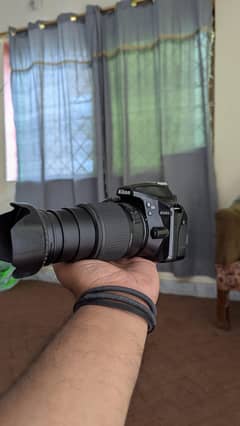 Niko d3400 DSLR camera with 55 200 zoom lens