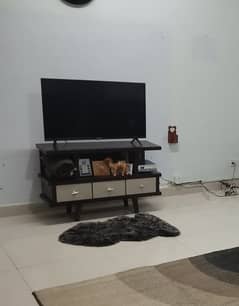 TCL 43 inches Smart LCD along with concole.
