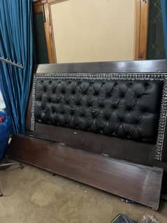 King sized wooden bed