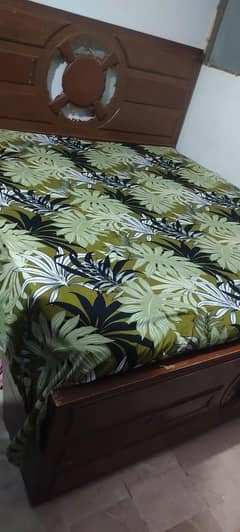 bed with side table and also dressing