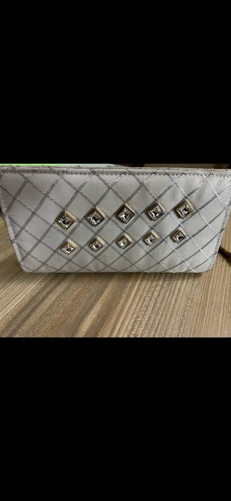 It’s clutch for a party function used both are in silver colour 6