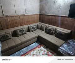 L Shaped new Sofa like new with foldable table