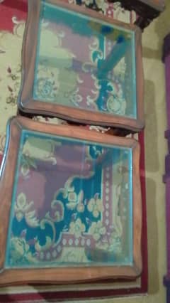 two small wooden Glass tables used but in a good condition