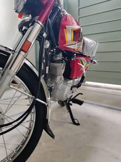 Honda 125 open invoice red color urgent sale