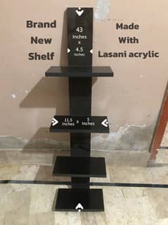Wall shelf items holder
