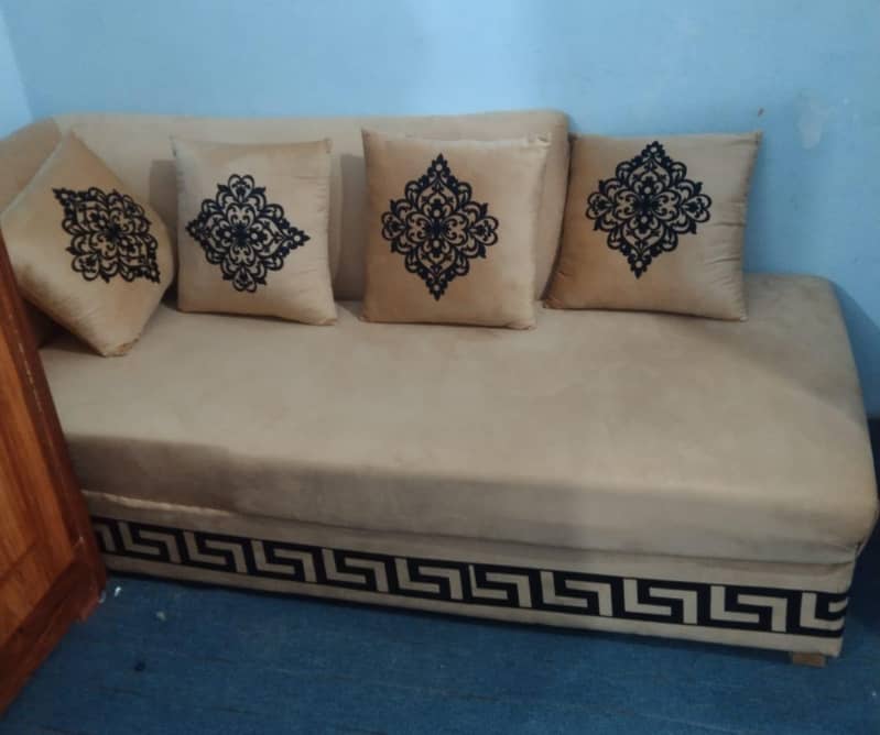L Shape Sofa with front table and cushions 1