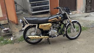 Honda 125 Sp Edition Golden No (2)+Security Alarm