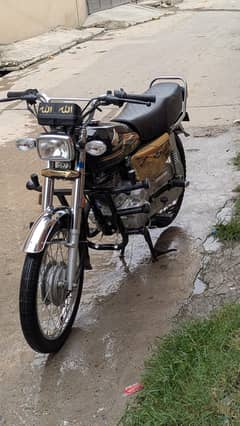 Honda 125 Sp Edition Golden No (2)+Security Alarm