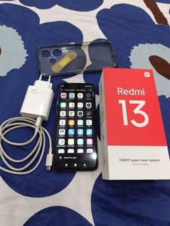 Redmi 13 8. GB/128. GB 5 month use mobile with warranty