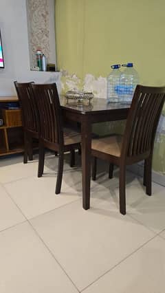 large table with 3 chairs