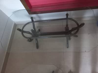 Wooden tables with glass top