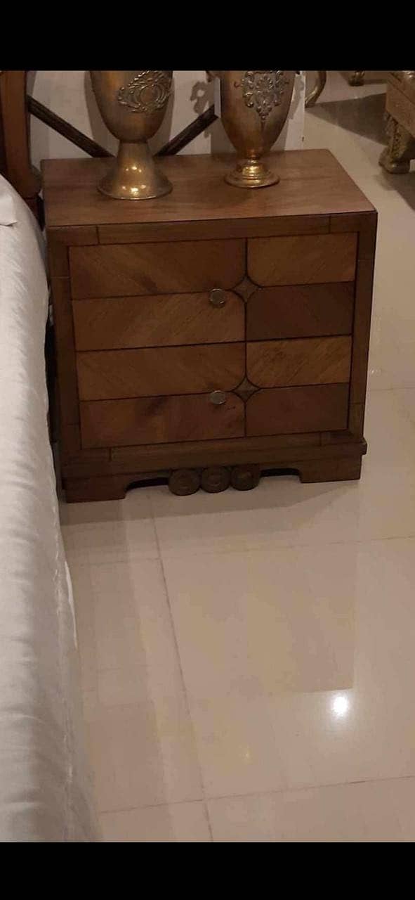 Bed with side tables and dressing table. 1