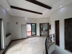 AC Installed 1 Kanal Slightly Used Modern Design House For Rent In DHA Phase 4 Block-FF Lahore.