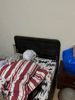 wooden single bed
