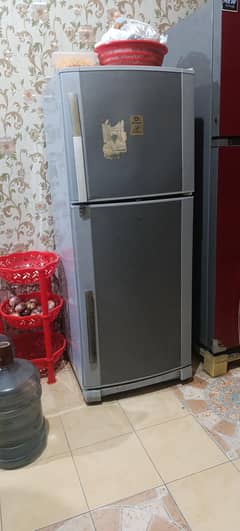 medium size refrigerator in good condition for sale