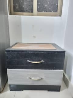 Wooden Beds (two) without mattress, four side tables and one cupboard
