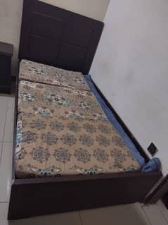 single wooden bed