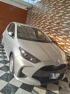 Toyota Yaris hatchback 2021 import 2025 , in pak only 5000 km driven.