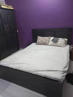 queen bed and wardrobe
