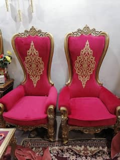 2 chairs with table