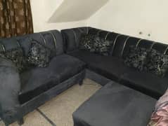 L shaped sofa with cushions