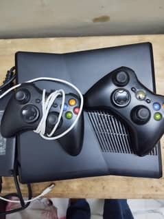 Xbox 360 + 2 controllers  (  1 wired , 1wireless )