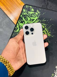 I phone 15 pro jv natural titanium colour with box and cable