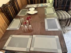 Dining table of wood with 8 chairs