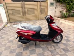 United Scooty 100 cc petrol 2024 model 650 km driven only like new