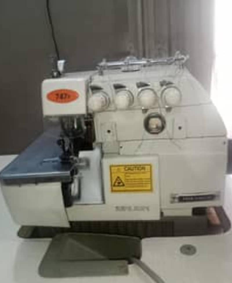 Juita 747F overlock machine New an touch 2