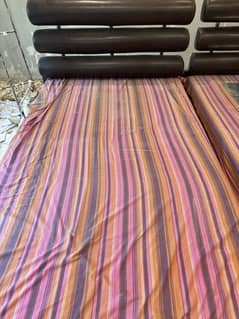 2 single beds for sale, one for 30k and two for 50k with side tables