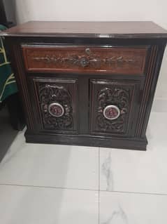 bed with side table and dressing table