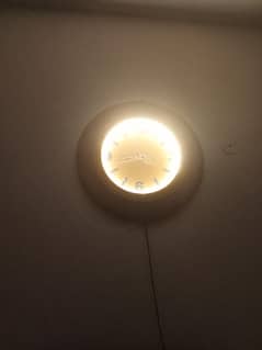 lit wall clock