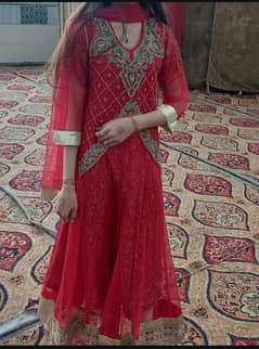 Red Maxi with full flair insade and body and daman embroidered