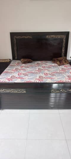 King size bed with side table, no mattress