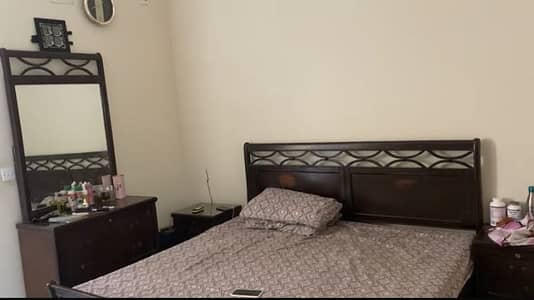 BED WITH SIDE TABLE AND DRESSING TABLE