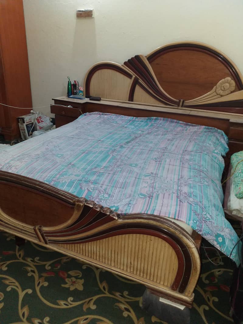 1 bed with side tables and 1 sofa set and 1 safe almari with 3 doors 1