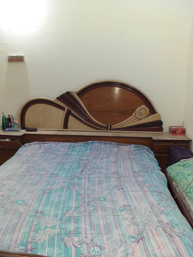 1 bed with side tables and 1 sofa set and 1 safe almari with 3 doors 2