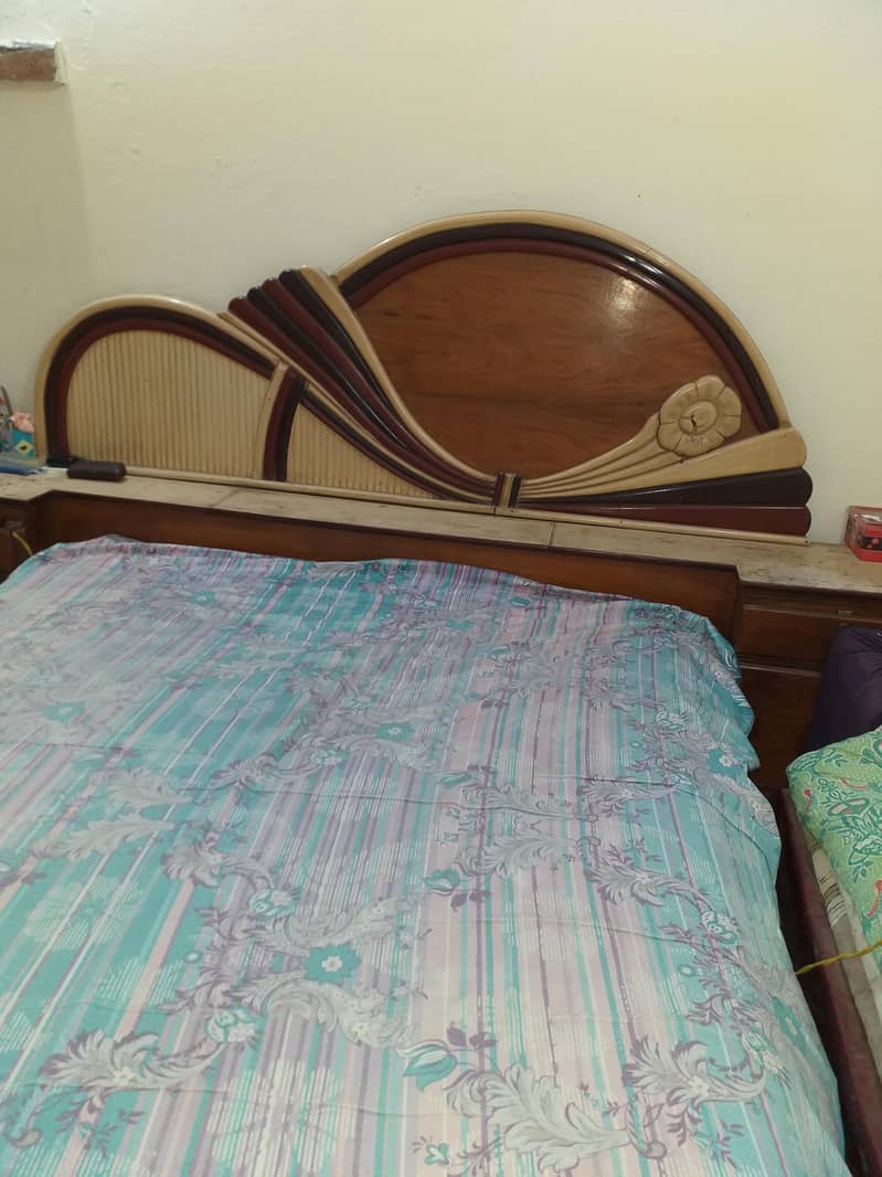 1 bed with side tables and 1 sofa set and 1 safe almari with 3 doors 5