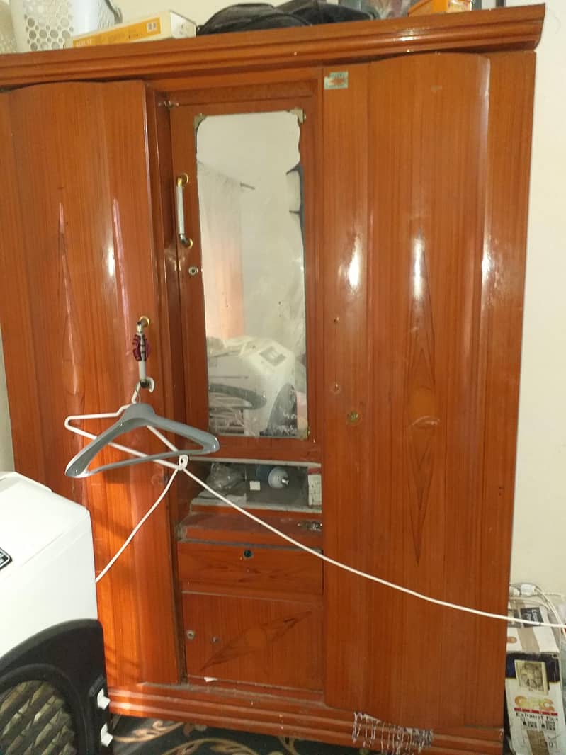 1 bed with side tables and 1 sofa set and 1 safe almari with 3 doors 6