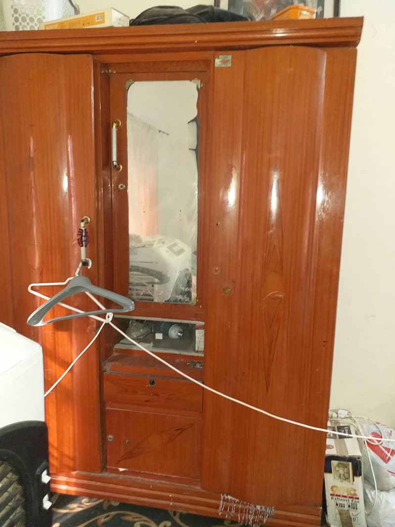 1 bed with side tables and 1 sofa set and 1 safe almari with 3 doors 7