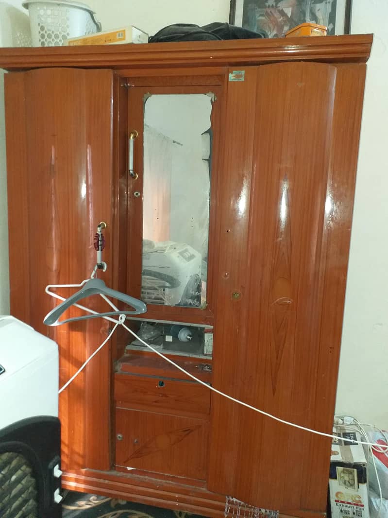 1 bed with side tables and 1 sofa set and 1 safe almari with 3 doors 8