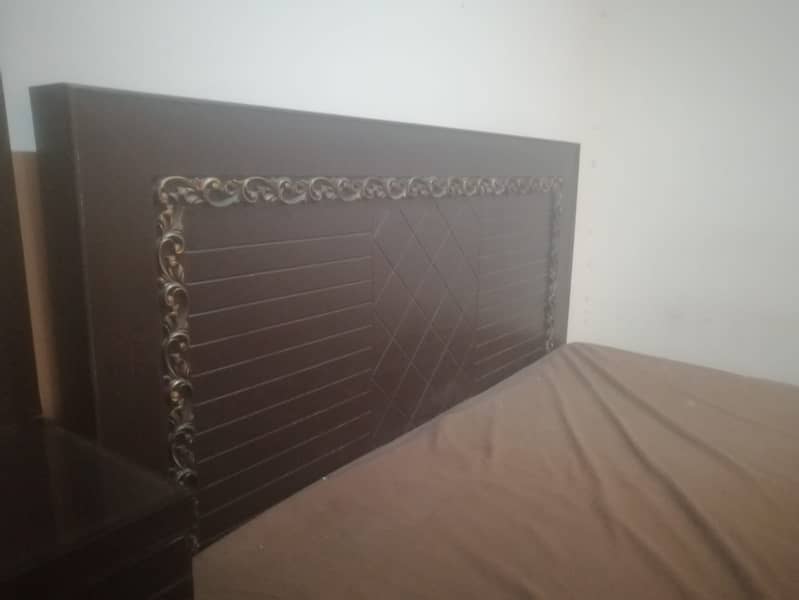 Double bed with imported mattress , side tables and dresing table 1