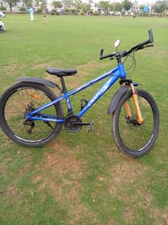 Caspian cycle Aluminum size 26. Gears Disc brakes or front shawkhs ok