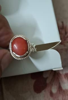 Natural Coral 6.42 crts  oval shape in silver ring