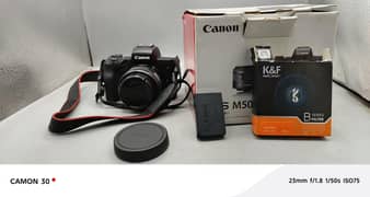 Canon m50 camera box and two batteries and filter condition 10 by 9