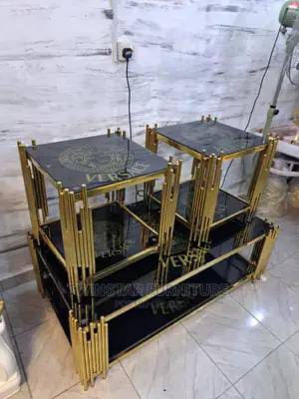 L shaped new sofa with 3 tables aik price ma delivery b available 2